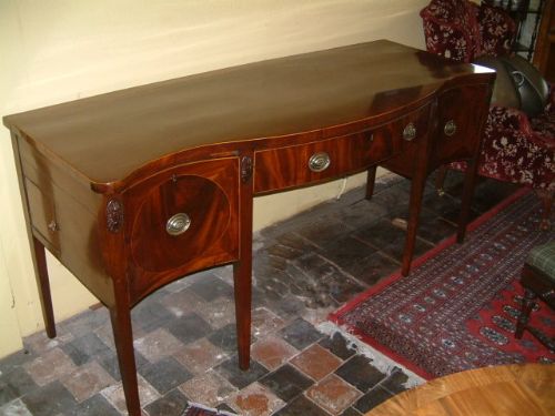 superb mahogany inlaid 18thc serpentine sideboard