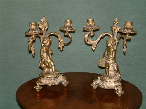 pair of mid victorian ormolu candelabra