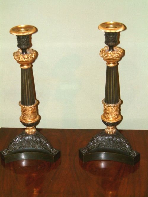 pair of 19thc bronze ormolu candlesticks