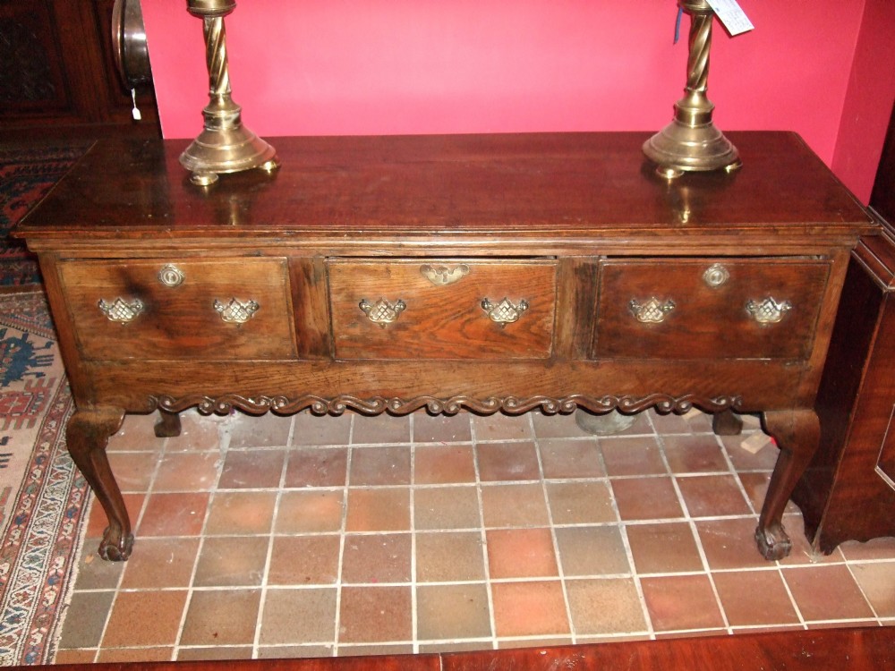 18thc oak dresserside server with rare carved apron