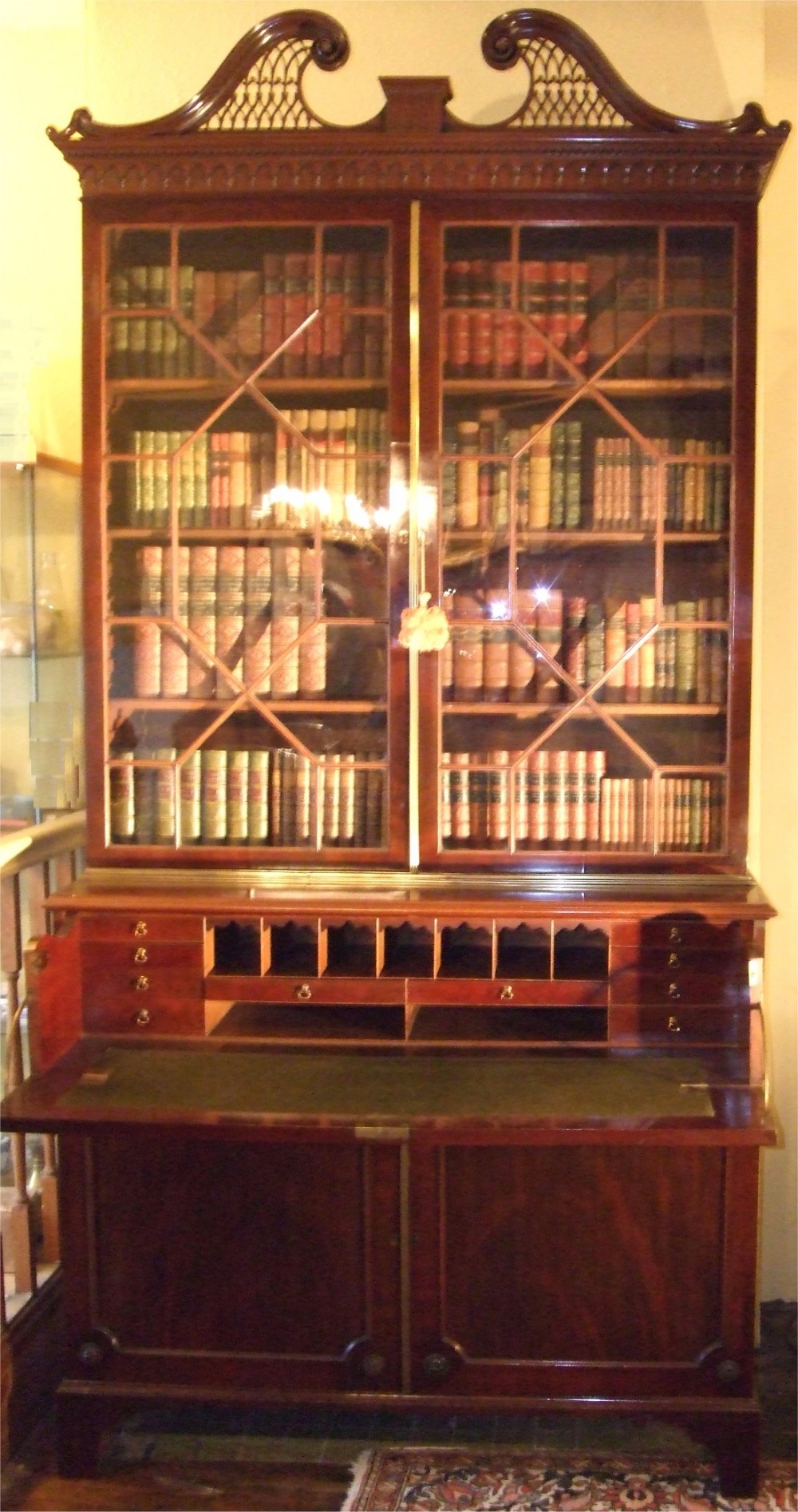 fine quality mahogany george3rd secretaire bookcase with swan neck pediment provenance lord gretton stapleford park leicestershire