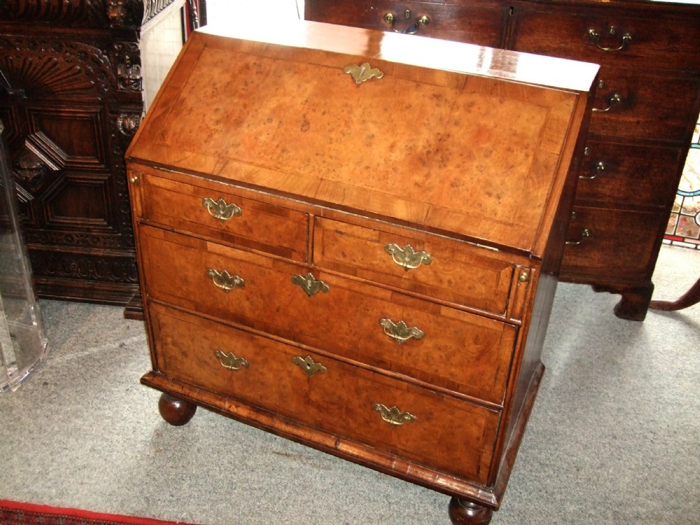 early 18th century walnut bureau on bun feet